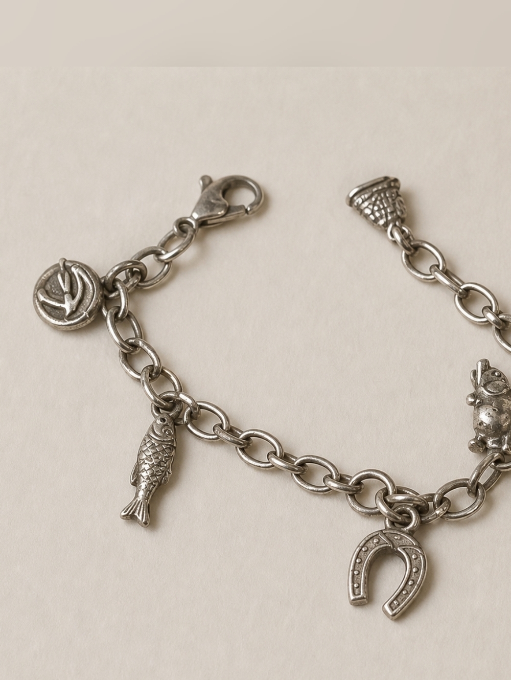 Brass Charm Bracelet with Horseshoe and Fish Charms